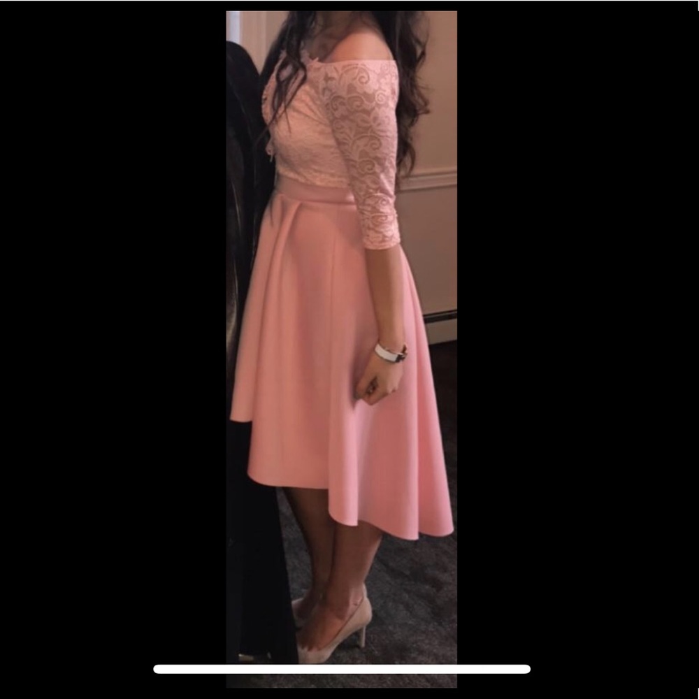 No sign of wear. Blush high low midi dress